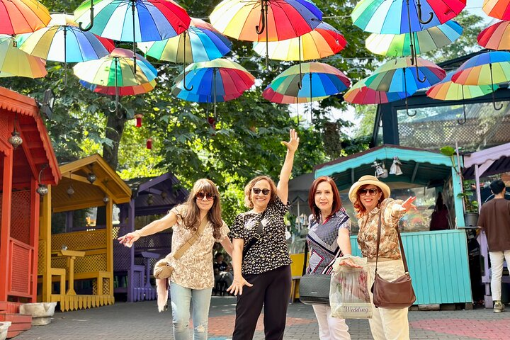 Experience the charm of Istanbul’s colorful streets as you explore hidden gems interact with locals and enjoy lively surroundings filled with art and culture under a canopy of umbrellas.