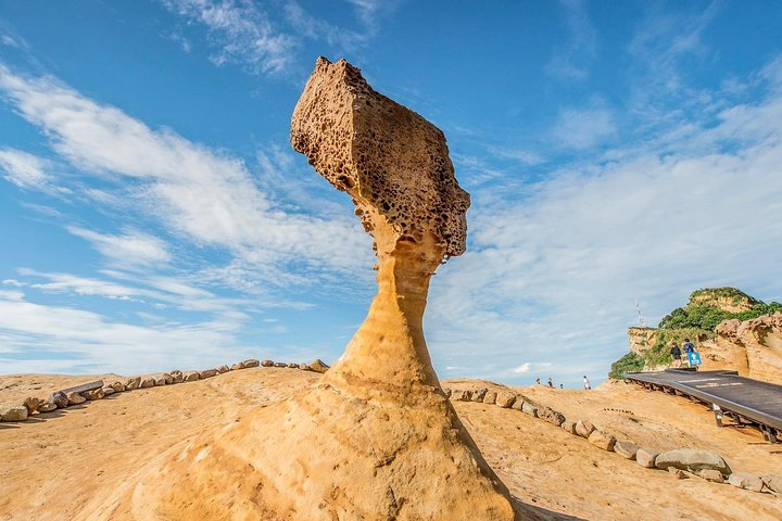Experience the unique rock formations of Yehliu Geopark where nature's artistry shapes the coastline inviting travelers to marvel at its geological wonders and stunning views.