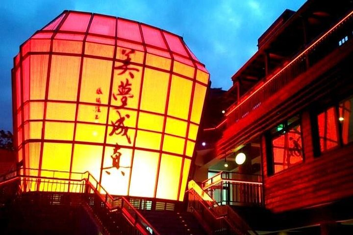Illuminate your journey through Jiufen Old Street as the lanterns cast a warm glow inviting exploration of local flavors and stunning views—a perfect day tour experience in Taipei.