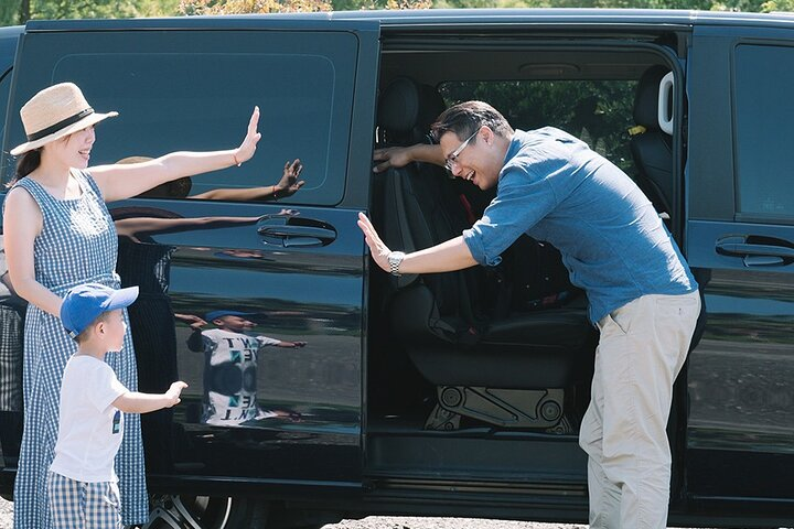 Discover the beauty of Yangmingshan National Park with a personalized car charter enjoying stunning views while a professional driver navigates the route ensuring comfort and ease.