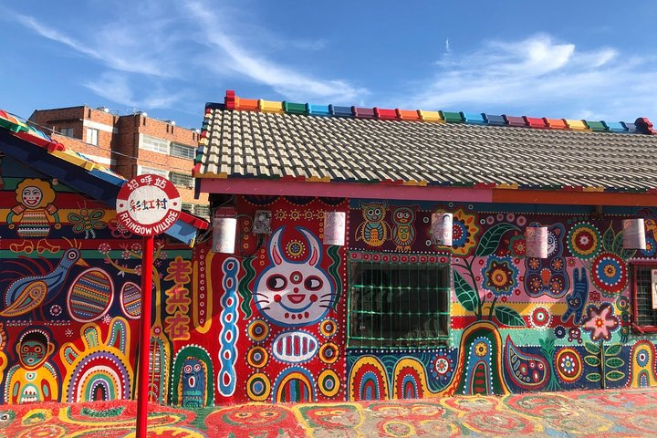 Explore the colorful murals of Rainbow Village where every corner tells a unique story through vivid art perfect for capturing memorable travel moments in Taichung.