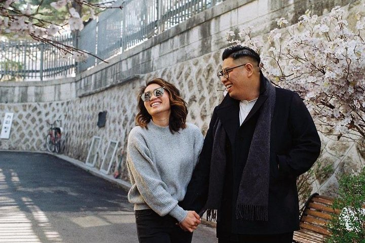 Capture unforgettable moments in Taipei as you stroll through scenic paths lined with cherry blossoms. Let a local photographer turn your special adventures into lasting memories together.