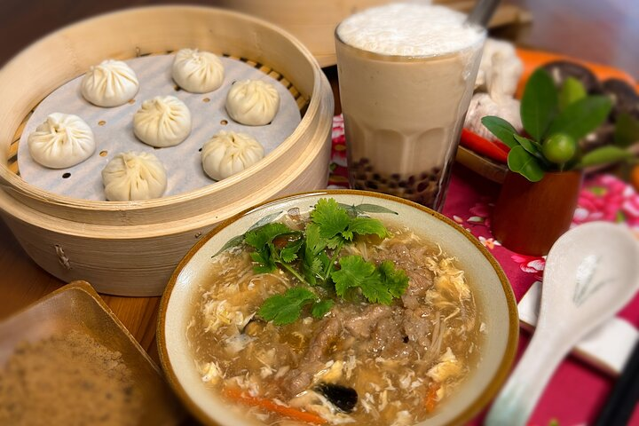 Experience the joy of creating authentic Taiwanese flavors as you craft delicious Xiao Long Bao savory pork thick soup and refreshing bubble milk tea in a welcoming setting.