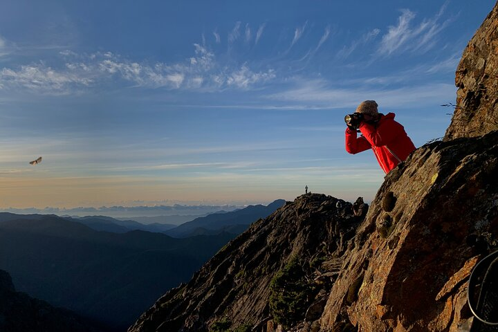Watching the sunrise at the peak of Yushan mountain.
