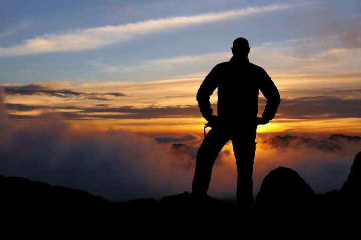 Above the clouds and sunset.