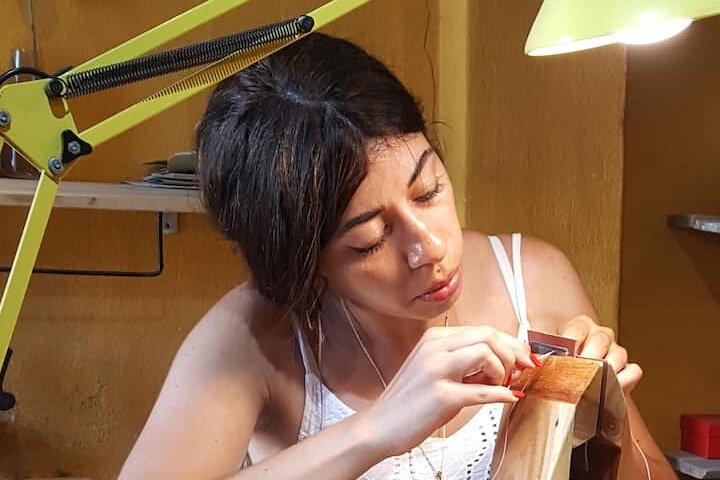 Immerse yourself in the art of leather crafting surrounded by tranquility. Create unique pieces under guidance using premium materials in a cozy studio perfect for creative travelers.