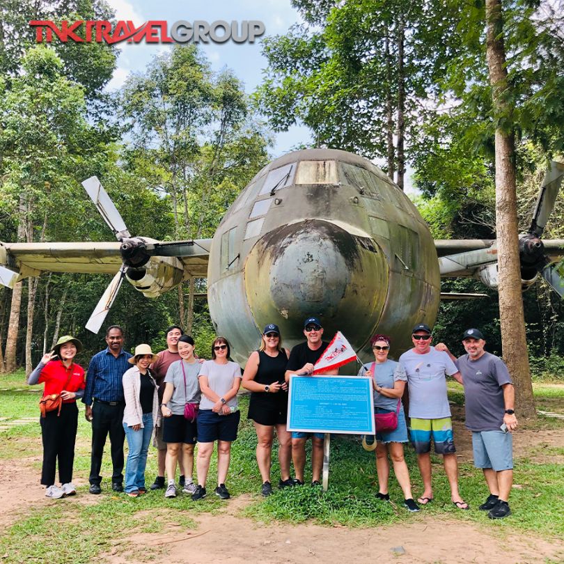 Experience the rich history of the Cu Chi Tunnels while standing in awe of a historic aircraft. Engage with fellow travelers as you explore Vietnam's war-era ingenuity and resilience.