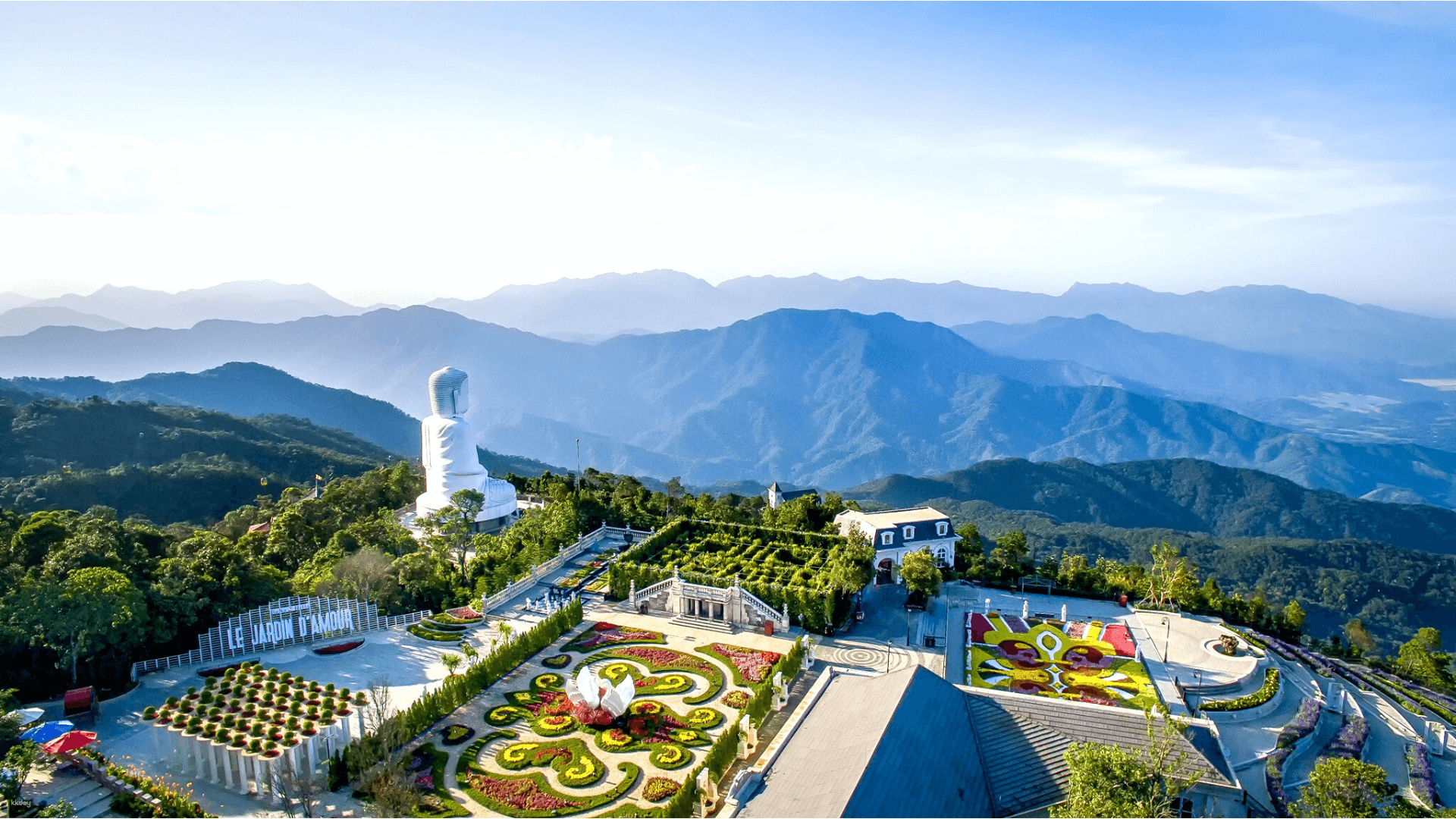 Discover stunning mountain views from Ba Na Hills featuring the majestic Lady Bodhisattva statue and beautifully landscaped gardens perfect for unforgettable memories and breathtaking photo opportunities.