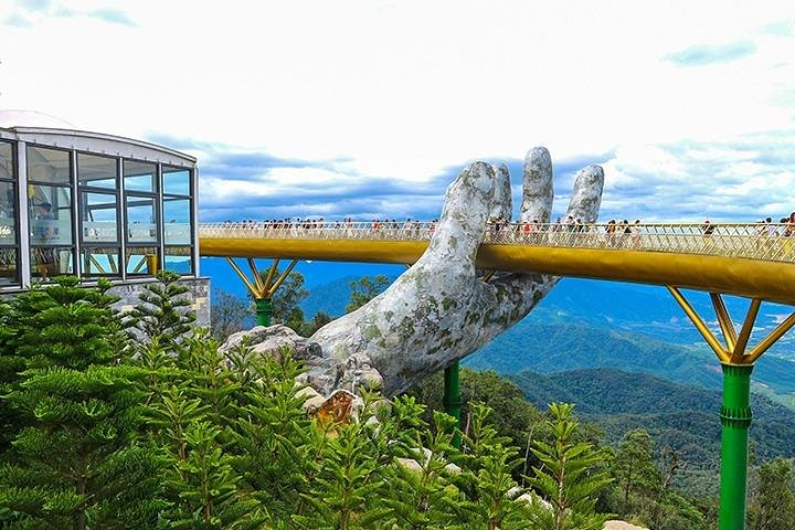 Ascend to the stunning heights of Ba Na Hills where breathtaking views and the iconic Golden Bridge intertwine creating unforgettable moments for every traveler in this unique landscape.