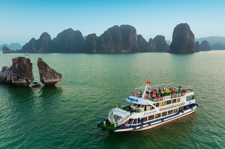 Experience the stunning beauty of Halong Bay aboard a luxury cruise. Enjoy a delightful buffet lunch while exploring breathtaking rock formations and engaging in exciting outdoor activities.