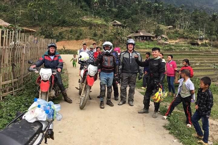 Explore Sapa's stunning rice terraces and engage with local ethnic minorities on an unforgettable motorbike adventure immersing in their culture and traditions while surrounded by breathtaking landscapes.