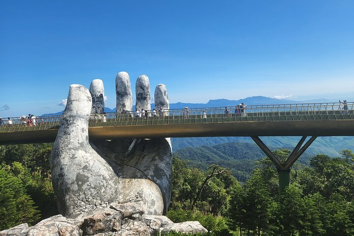 Guided Tour toGOLDEN BRIDGE,MARBLE MOUTAIN,DRAGON BRIDGE fromTIEN SA or CHAN MAY - Photo 1 of 25