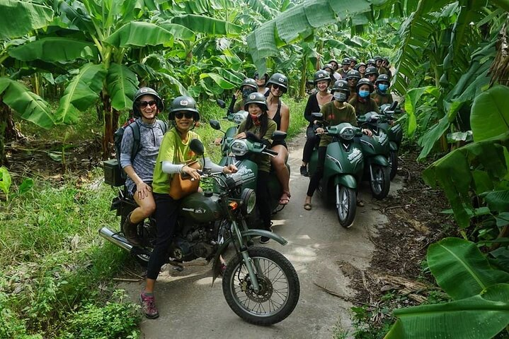 Riding motorbike in the rural area of Hanoi