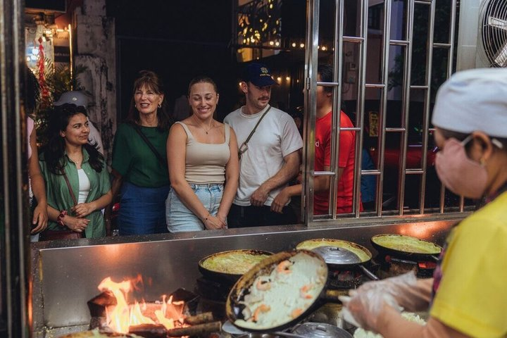 Saigon Night Bites on Foot: Local Vendors, Stories & Sweet Finish - Photo 1 of 9