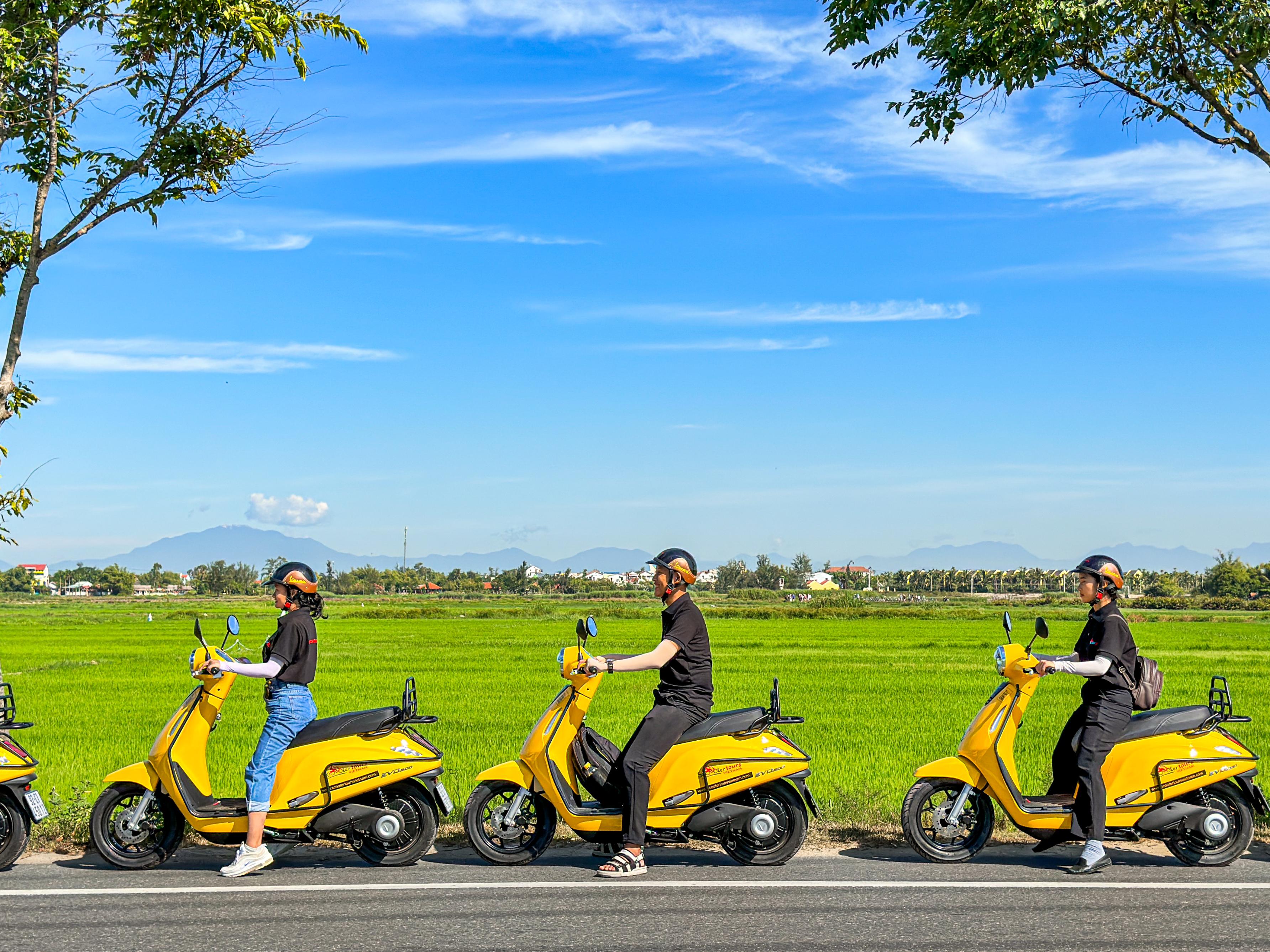 Experience the tranquility of Hoi An's countryside as you ride eco-friendly electric scooters through lush green fields connecting with locals and exploring stunning landscapes at your own pace.