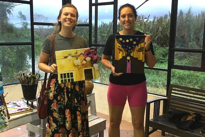 Creativity flourishes as participants proudly showcase their unique artworks surrounded by the serene beauty of Hoi An's landscape making for an unforgettable artistic journey.