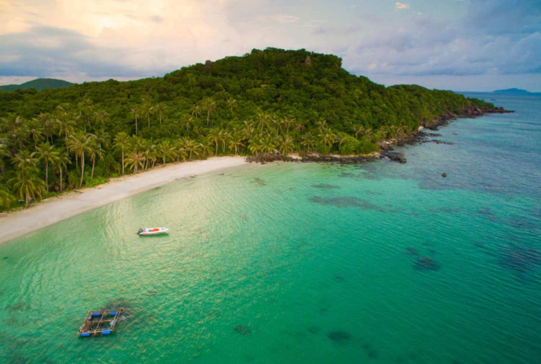 Explore the stunning shores and crystal-clear waters of Phu Quoc's islands perfect for snorkeling and basking under the sun offering a delightful escape for nature lovers and adventurers alike.