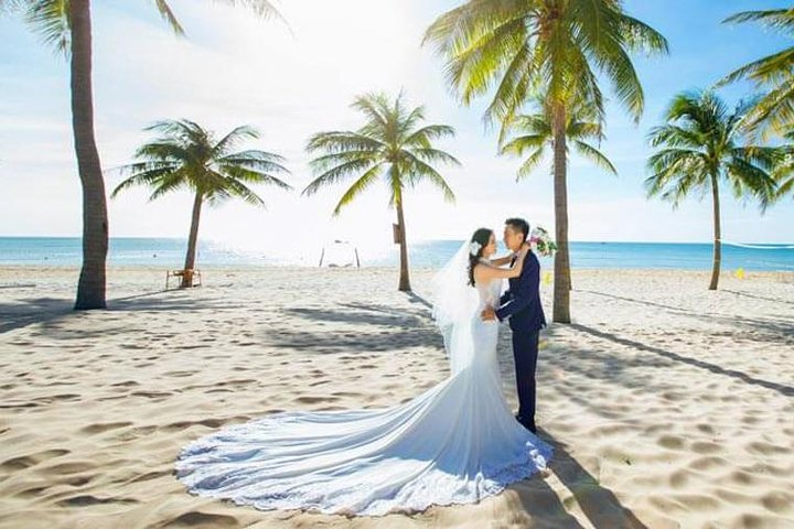 Capture timeless memories against the backdrop of Phu Quoc's stunning beach where the sun sand and palm trees create the perfect setting for your special moments.
