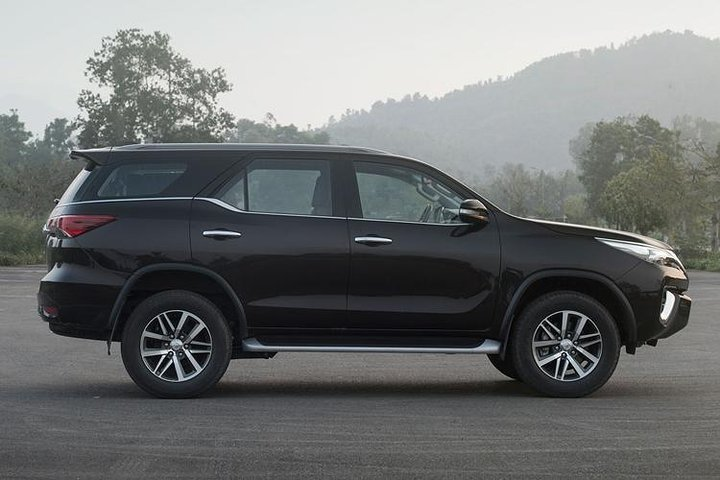 Experience the serene landscapes of Ba Vi National Park from the comfort of a modern air-conditioned vehicle where every journey feels effortless and enjoyable.