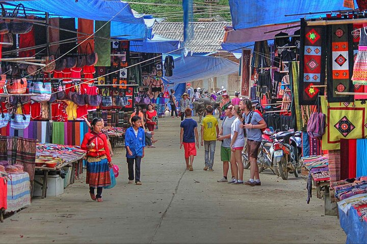 Wander through colorful stalls and engage with local vendors discovering the unique crafts and traditions of Sapa’s ethnic communities while immersing yourself in the local market culture.