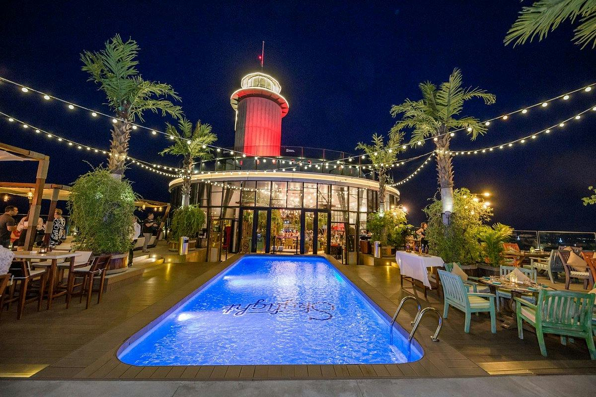 Skylight 360 Skydeck & Rooftop Beach Club Nha Trang: Admission + Signature Beverage + Snack - Photo 1 of 6