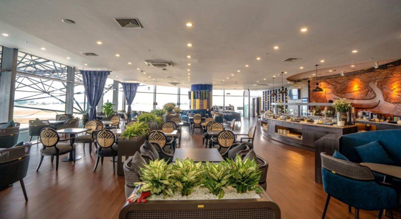 Relax in a serene setting at Song Hong Lounge where modern amenities meet Hanoi's cultural charm providing a perfect retreat for weary travelers at Noi Bai International Airport.