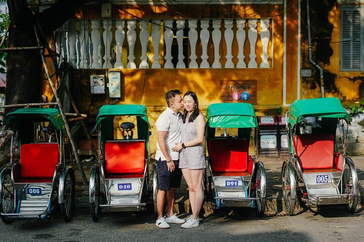 Capture timeless moments in Hoi An where love flourishes amidst charming streets and traditional cyclos creating the perfect backdrop for unforgettable wedding proposal memories.