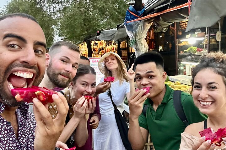 Group tasting red dragon fruit