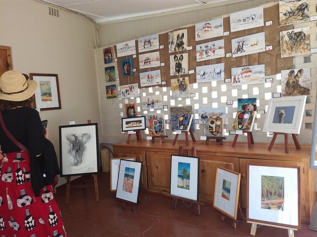 Verandah Gallery featuring beautiful paintings and drawings from local arists.
