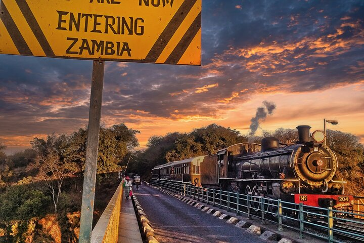 Steam train coming from Zambia crossing the biridge into Zimbabwe